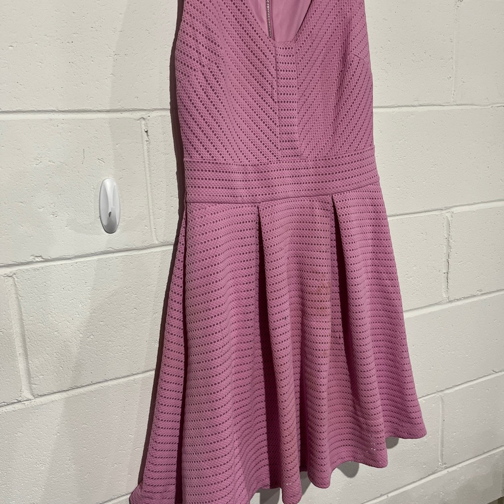Sleeveless dress with twirl bottom and V cut back